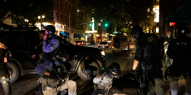 A man is being treated after being shot Saturday, Aug. 29, 2020, in Portland, Ore. (Associated Press)