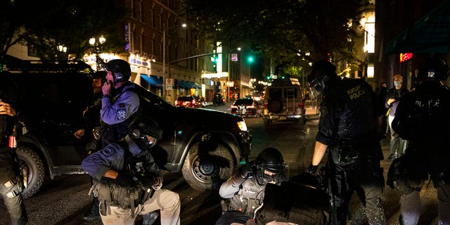 A man is being treated after being shot Saturday, Aug. 29, 2020, in Portland, Ore. [Associated Press)