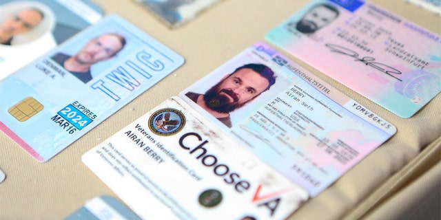 The photo released by the Venezuelan President Miraflores' press office shows what the Venezuelan government identifies as the identity card of former US special forces citizen Airan Berry, right and Luke Denman, left, at Caracas, Venezuela.