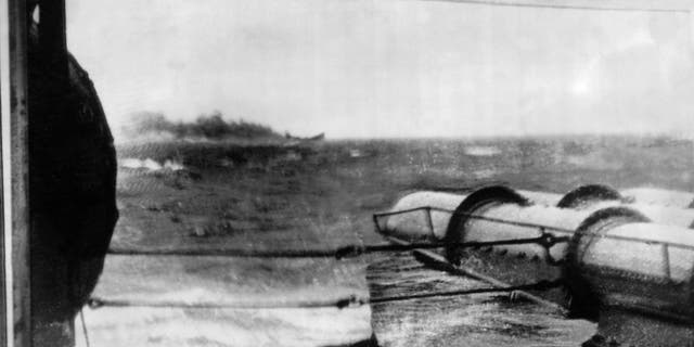 A view of the German battleship Bismarck as it was sinking, torpedoed by a British ship off Brest.