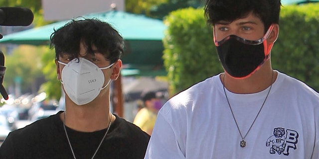 Bryce Hall (L) and Blake Gray (R) are seen on August 20, 2020 in Los Angeles, California. Los Angeles Mayor Eric Garcetti recently ordered the power shut off at Sway House for hosting parties in defiance of COVID-19 public health regulations.