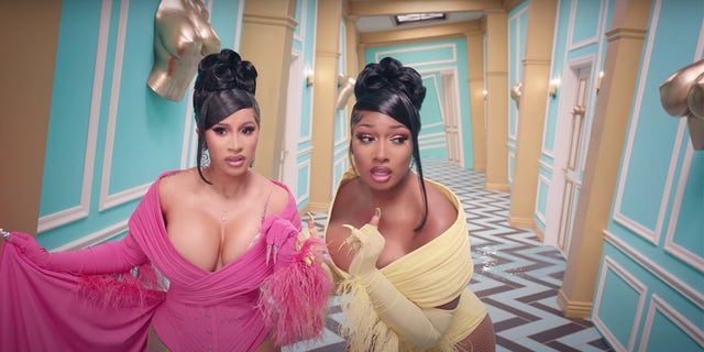 Cardi B (left) and Megan Thee Stallion in the music video for 'WAP.' The song has been criticized for its explicit lyrics.