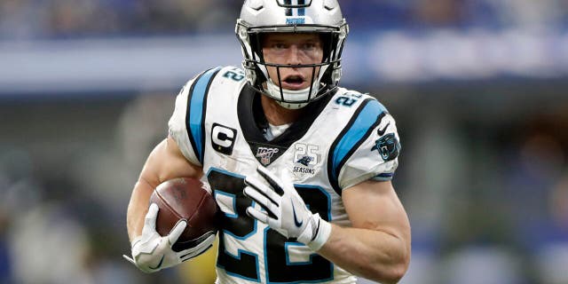 Carolina Panthers' Christian McCaffrey runs during the second half of an NFL football game against the Indianapolis Colts, in Indianapolis. McCaffrey's versatility and superb statistics helped him to a rare double: The Carolina Panthers running back has made The Associated Press NFL All-Pro Team at two positions. (AP Photo/Michael Conroy, File)