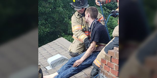 The Evansville Fire Department took apart the chimney to free Cody Methanial Sargent, 29.