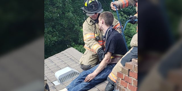 The Evansville Fire Department took apart the chimney to free Cody Methanial Sargent, 29.