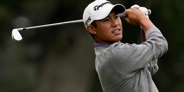 Collin Morikawa watches his tee shot on the third hole during the final round of the PGA Championship golf tournament at TPC Harding Park Sunday, Aug. 9, 2020, in San Francisco. (AP Photo/Jeff Chiu)