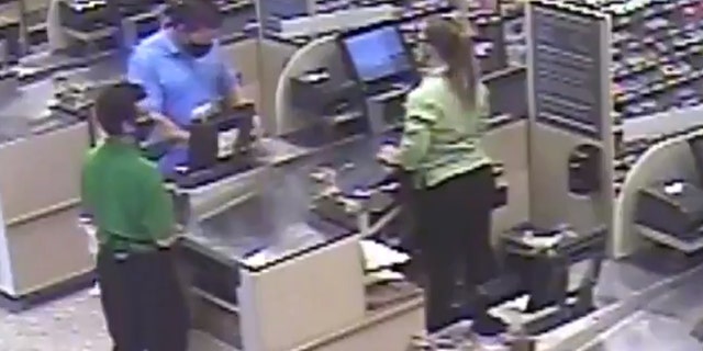 Image from video police say shows a man wanted for punching a 75-year-old man in a social distancing assault at a Florida Publix.