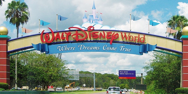 Lake Buena Vista, Florida, USA - August 19, 2015: an entrance of Walt Disney World Resort. Some cars are visible.