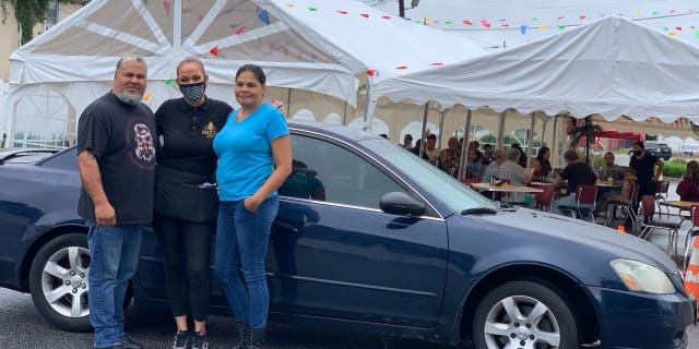 Lisa Mollet is a waitress at the Empire Diner in Brooklawn, N.J. and was shocked to recently receive quite the generous gratuity in the form of a car, pictured.