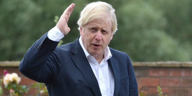 British Prime Minister Boris Johnson speaks to local people at the Canal Side Heritage Centre in Beeston on July 28, 2020, in Beeston near Nottingham, England. The government is launching a new cycling intuitive to help get people fitter. (Photo by Rui Vieira - WPA Pool/Getty Images)