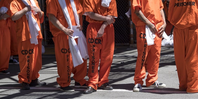 Inmates stand outside at San Quentin State Prison in San Quentin, Calif., on Aug. 16, 2016. (David Paul Morris/Bloomberg via Getty Images)
