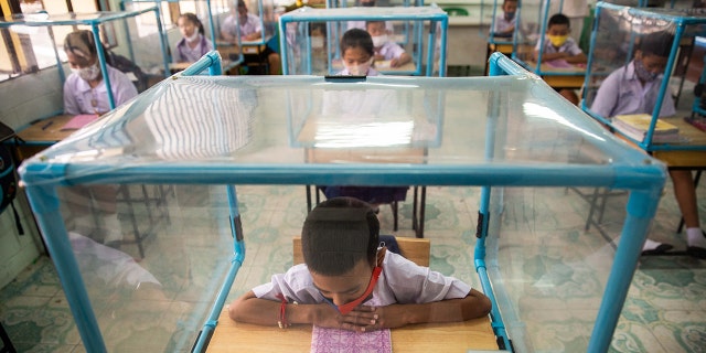 Plastic screens also have been set up around desks at the school. (Getty Images)