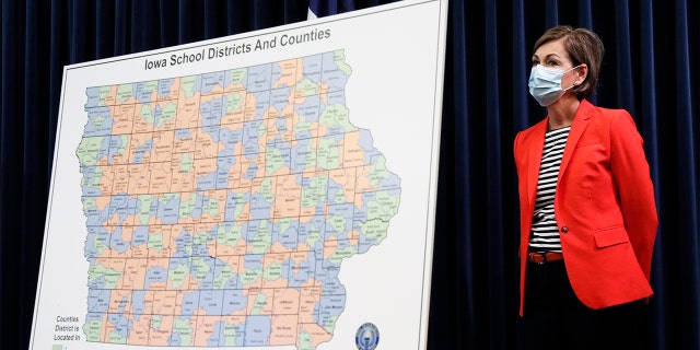 July 30, 2020: Iowa Gov. Kim Reynolds listens to a question during a news conference on the state's guidance for returning to school in response to the coronavirus outbreak in Des Moines, Iowa.