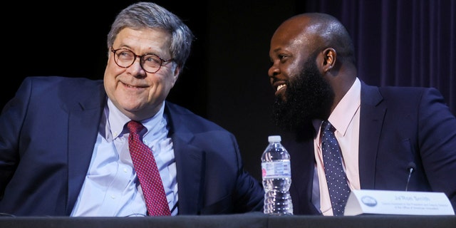 U.S. Attorney General Bill Barr speaks with Ja'Ron Smith as President Trump holds a roundtable discussion at Gateway Church Dallas Campus in Dallas, June 11, 2020. (REUTERS/Jonathan Ernst)