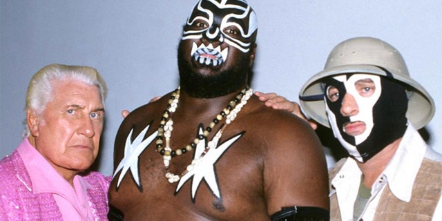 WWE star James 'Kamala' Harris (middle) has died at the age of 70. (Courtesy of WWE)