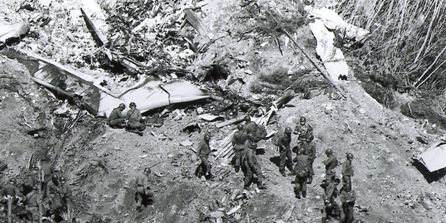 Air Disaster - Rescue workers search for survisors of the Japan Air Lines 747 jetliner that crashed Monday night, August 12, 1985 into a mountain in central Japan. The plane crashed into remote mountains making rescue efforts difficult. The AP-Photo shows rescue operations conducted by the Japan Self Defense Forces on August 13th. (AP-Photo)