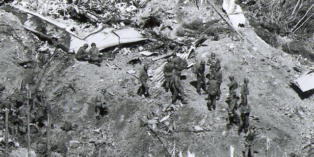 Air Disaster - Rescue workers search for survisors of the Japan Air Lines 747 jetliner that crashed Monday night, August 12, 1985 into a mountain in central Japan. The plane crashed into remote mountains making rescue efforts difficult. The AP-Photo shows rescue operations conducted by the Japan Self Defense Forces on August 13th. (AP-Photo)