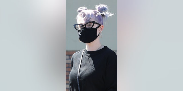 TV personality Kelly Osbourne, 35, was seen exiting a CVS Pharmacy in Los Angeles on Wednesday showing off her slender figure.