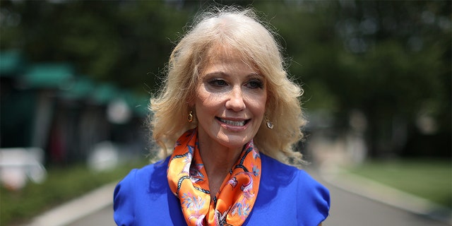 Kellyanne Conway, who advised former President Donald Trump for much of his time in the White House, walks back into the West Wing following an interview with Fox News outside the White House July 7, 2020, in Washington. Conway is endorsing former Ohio Republican Party chair Jane Timken for in the Ohio Senate race Tuesday. (Photo by Chip Somodevilla/Getty Images)