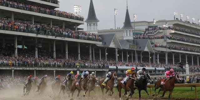 FILE - In this Saturday, May 4, 2019 file photo, Flavien Prat on Country House, third from right, races against Luis Saez on Maximum Security, right, during the 145th running of the Kentucky Derby horse race at Churchill Downs in Louisville, Ky. Maximum Security finished first but was disqualified. The fastest two minutes in sports will also be the quietest in Kentucky Derby history. (AP Photo/Darron Cummings, File)