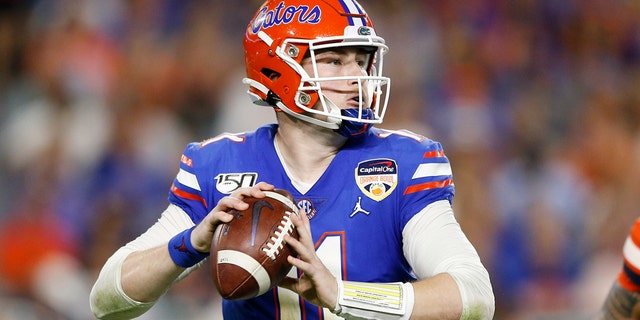 Kyle Trask has been one of the best players in college football. (Photo by Michael Reaves/Getty Images)