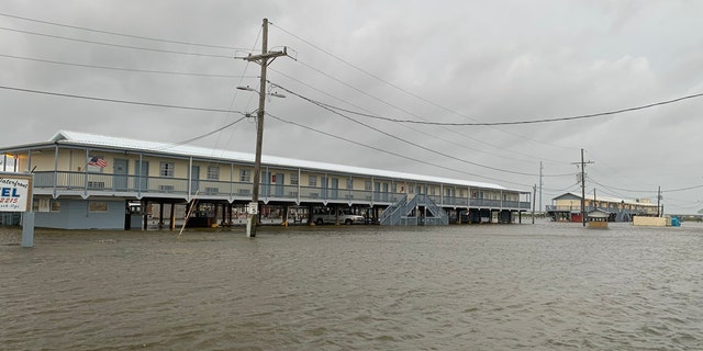 Rising waters as storm surge from Hurricane Laura nears the Gulf Coast can be seen on Wednesday, Aug. 26, 2020.