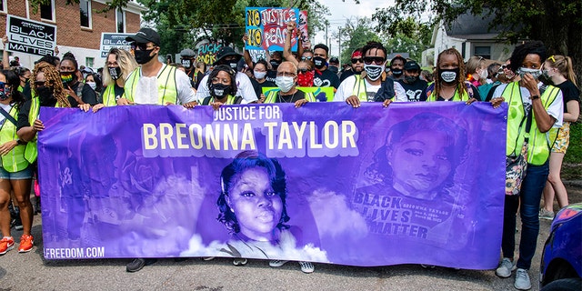 Protesters participate in the Good Trouble Tuesday march for Breonna Taylor, on Tuesday, Aug. 25, 2020, in Louisville, Ky. (Amy Harris/Invision/AP)