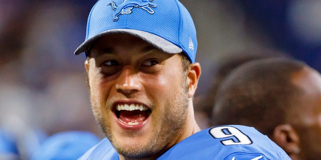 In this Aug. 18, 2016, file photo, Detroit Lions quarterback Matthew Stafford smiles on the sideline during an NFL football game against the Cincinnati Bengals at Ford Field in Detroit. (AP Photo/Rick Osentoski)