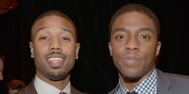 Michael B. Jordan (left) is said to be 'struggling' with the death of his 'Black Panther' co-star Chadwick Boseman. (Photo by Charley Gallay/Getty Images for CinemaCon)