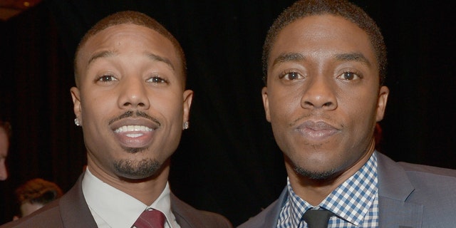 Michael B. Jordan (left) is said to be 'struggling' with the death of his 'Black Panther' co-star Chadwick Boseman. (Photo by Charley Gallay/Getty Images for CinemaCon)