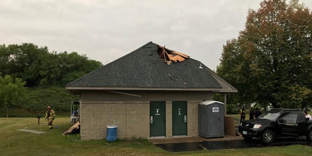 Damage to a park shelter after a lightning strike on Saturday in Lakeville, Minn.