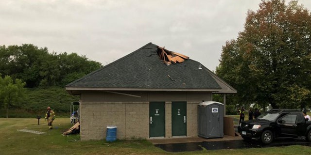 Damage to a park shelter after a lightning strike on Saturday in Lakeville, Minn.