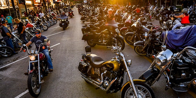 Motorcyclists drive down Main Street during the 80th Annual Sturgis Motorcycle Rally on August 7, 2020 in Sturgis, South Dakota. (Photo by Michael Ciaglo/Getty Images)