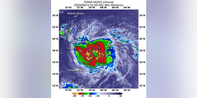 On Aug. 22 at 11 p.m. EDT the MODIS (Moderate Resolution Imaging Spectroradiometer) instrument on the Terra satellite revealed the most powerful thunderstorms (yellow) surrounded Laura’s center where cloud top temperatures were as cold as or colder than minus 80 degrees Fahrenheit, according to NASA. Strong storms with cloud top temperatures as cold as minus 70 degrees (red) Fahrenheit surrounded those areas and blanketed Hispaniola and were dropping large amounts of rain, the space agency said.