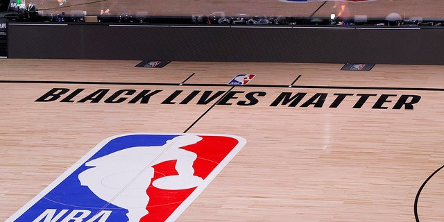 Black Lives Matter was a mainstay message on NBA courts over the summer. (Kevin C. Cox/Pool Photo via AP)