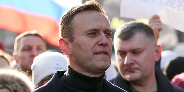 Alexey Navalny, Russian opposition leader, walks with demonstrators during a rally in Moscow, Russia, on Saturday, Feb. 29, 2019. ]Andrey Rudakov/Bloomberg via Getty Images