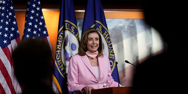 House Speaker Nancy Pelosi of Calif., speaks during a news conference on Capitol Hill in Washington, Aug. 22. The House is set for a rare Saturday session to pass legislation to halt changes in the Postal Service and provide $25 billion in emergency funds. (AP Photo/Susan Walsh)