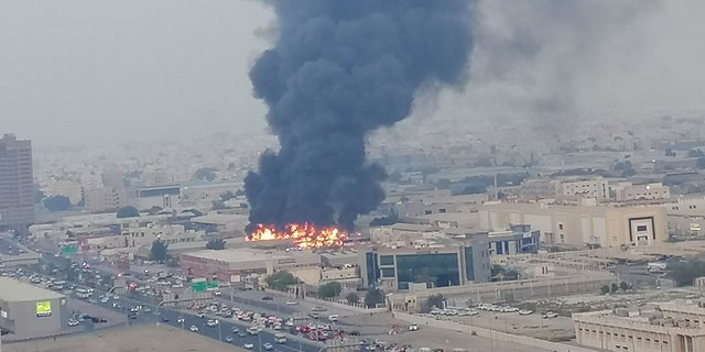 A fire and smoke is seen at a market in the emirate of Ajman, United Arab Emirates August 5, 2020 in this picture obtained from social media. 