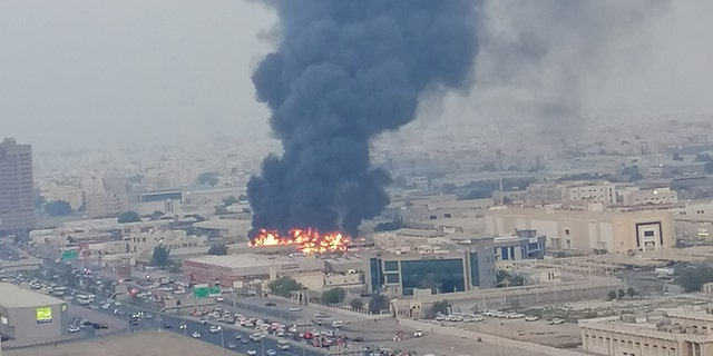 A fire and smoke is seen at a market in the emirate of Ajman, United Arab Emirates August 5, 2020 in this picture obtained from social media.