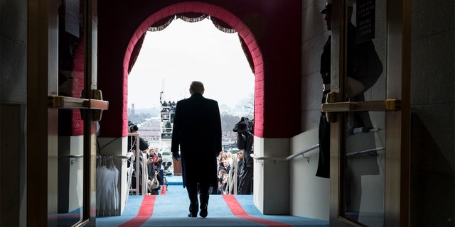 President-elect Donald Trump walks to take his seat at the swearing-in ceremony at the U.S. Capitol in Washington, D.C., on Friday, January 20, 2017. (Official White House Photo by Shealah Craighead)
