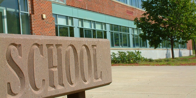 Front of school building in the morning, waiting for students to arrive.