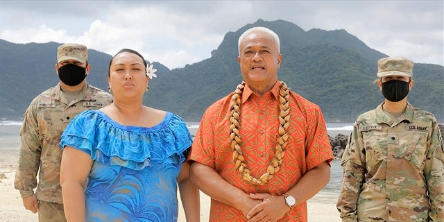 In this image from video, Aliitama Sotoa and Petti Matila of American Samoa speak during the state roll call vote on second night of the Democratic National Convention on Tuesday, Aug. 18, 2020. (Democratic National Convention via AP)