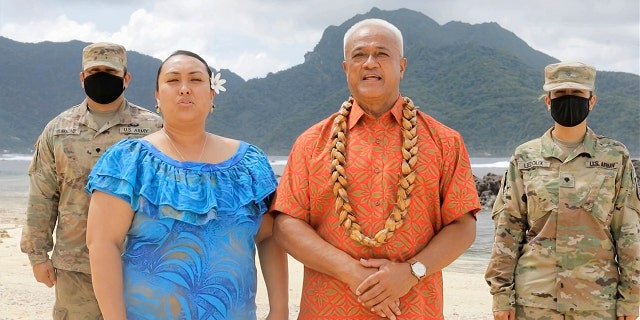 In this image from video, Aliitama Sotoa and Petti Matila of American Samoa speak during the state roll call vote on second night of the Democratic National Convention on Tuesday, Aug. 18, 2020. (Democratic National Convention via AP)