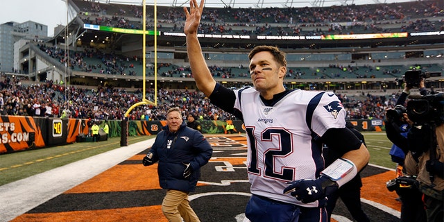 New England Patriots quarterback Tom Brady (12) waves to the crowd after an NFL football game against the Cincinnati Bengals, Sunday, Dec. 15, 2019, in Cincinnati. (AP Photo/Frank Victores)