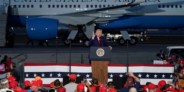 President Donald Trump speaks during a campaign rally at Manchester-Boston Regional Airport, Friday, Aug. 28, 2020, in Londonderry, N.H. (AP Photo/Charles Krupa)