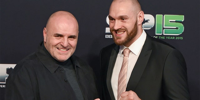 Boxer Tyson Fury and his father, John, arrive to BBC Sports Personality of the Year 2015 at the Titanic Belfast, Titanic Quarter, Olympic Way, Belfast, Co Antrim. Picture credit: Stephen McCarthy / SPORTSFILE