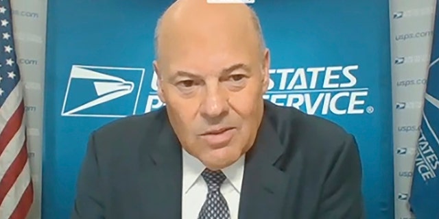 In this image from video, U.S. Postmaster General Louis DeJoy testifies during a video virtual hearing before the Senate Governmental Affairs Committee on the U.S. Postal Service during COVID-19 and the upcoming elections, Aug. 21, on Capitol Hill in Washington. (US Senate Committee on Homeland Security & Governmental Affairs via AP)