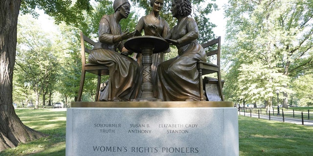 congress FILE -- The unveiling of the statue of women's rights pioneers Susan B. Anthony, Elizabeth Cady Stanton and Sojourner Truth is seen in Central Park in New York on August 26, 2020, marking the park's first statue of real-life women. (Photo by TIMOTHY A. CLARY/AFP via Getty Images)
