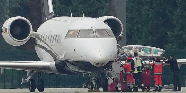 Alexei Navalny was flown to Germany Saturday following a dispute over whether he was stable enough to board an aircraft. ( Michael Kappeler/dpa via AP)