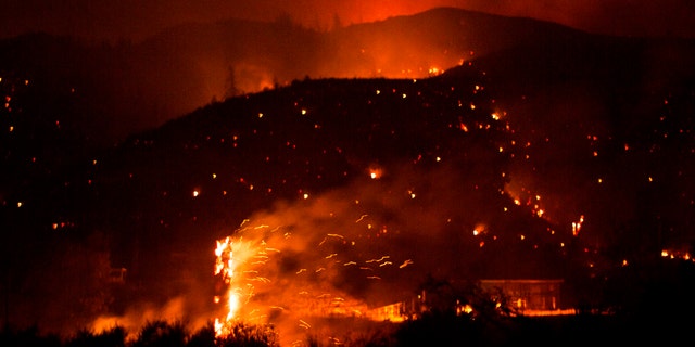 The Lake Hughes fire burns in Angeles National Forest on Thursday, Aug. 13, 2020, north of Santa Clarita, Calif.